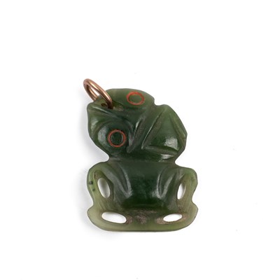 Lot 422 - A Maori nephrite jade tiki pendant, the...