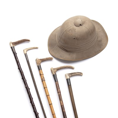 Lot 263 - An early 20th century pith helmet and five...