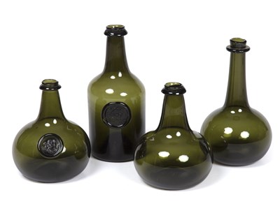 Lot 236 - Four reproduction English green glass bottles...