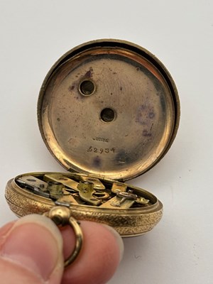Lot 281 - An open face fob watch, the floral and foliate...
