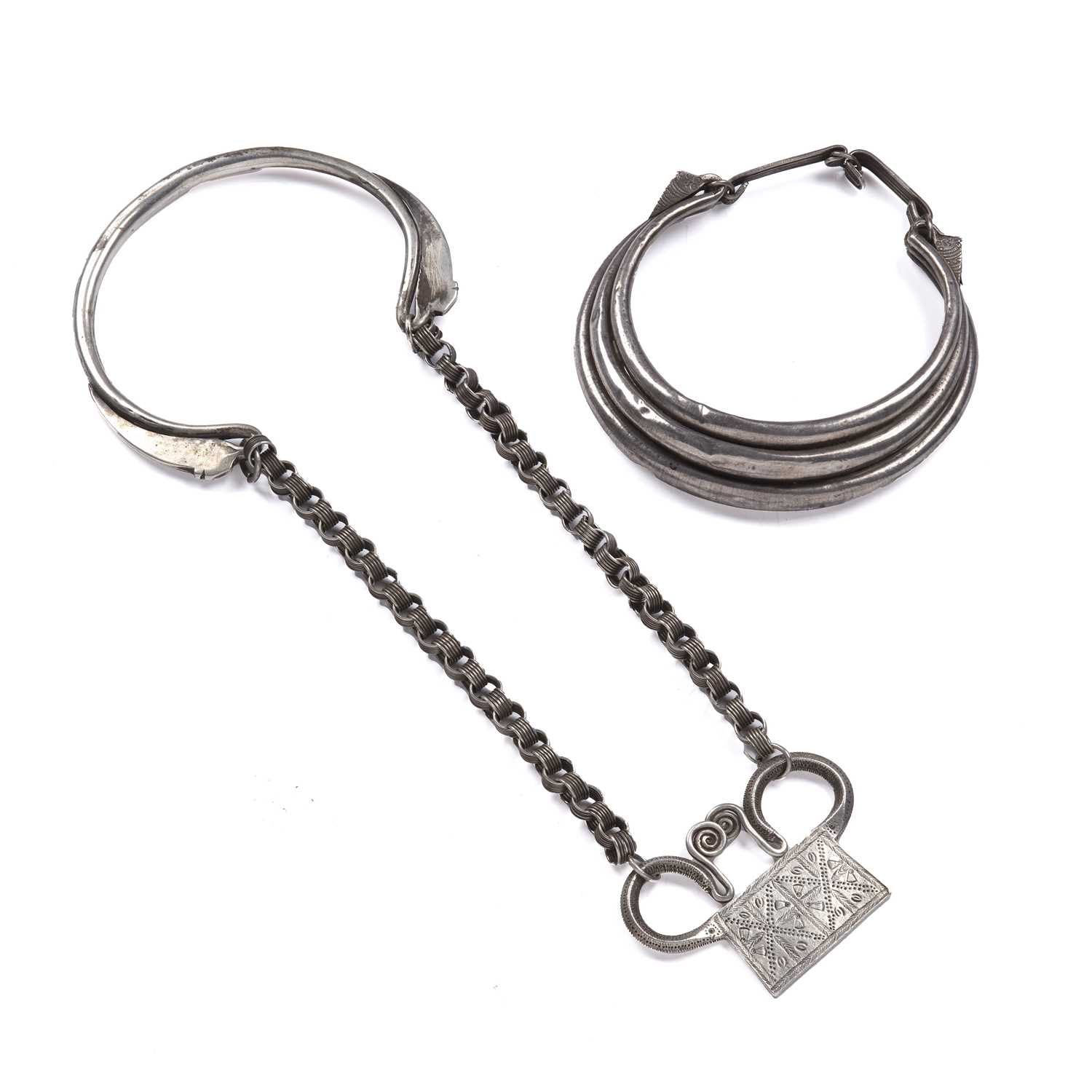 Lot 391 - Two white metal neck-rings Hmong (China), the...