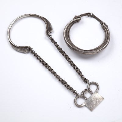 Lot 391 - Two white metal neck-rings Hmong (China), the...