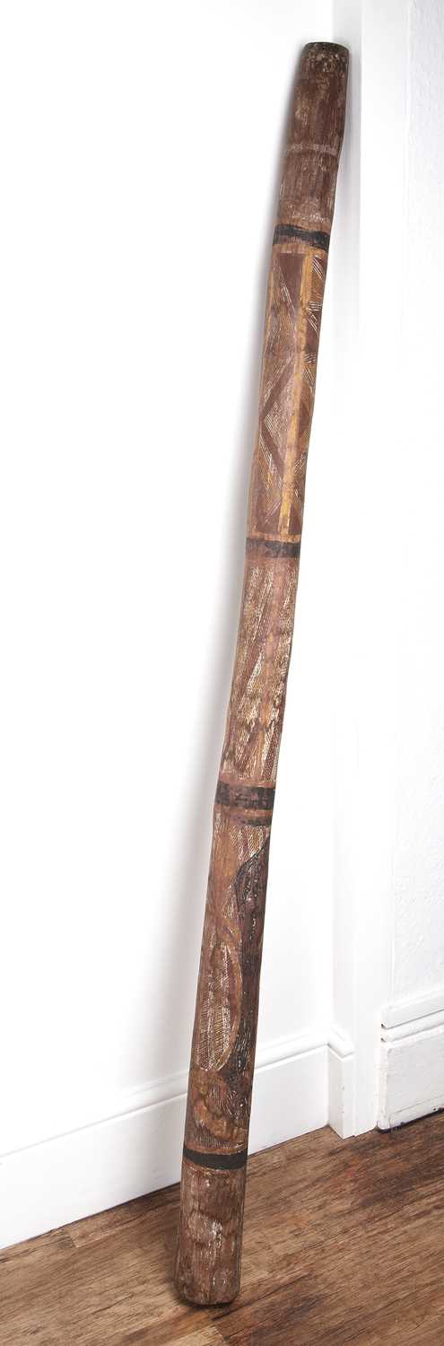 Lot 399 - Didgeridoo painted with geometric decoration,...