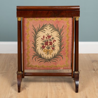 Lot 180 - A 19th century French Empire-style mahogany fire screen