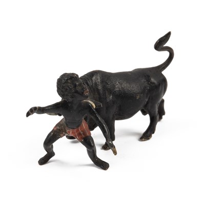 Lot 503 - An Austrian cold-painted bronze of a fellow fleeing from a bull