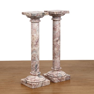 Lot 63 - Pair of pink and white marble columns of small...