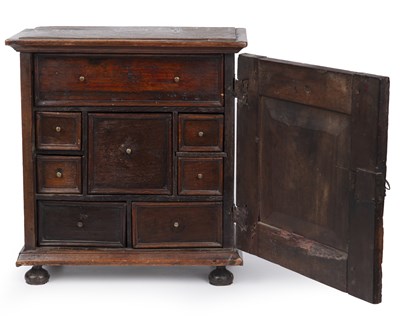 Lot 90 - A late 17th century oak table top cabinet of...