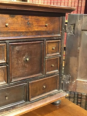 Lot 90 - A late 17th century oak table top cabinet of...