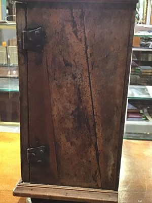 Lot 90 - A late 17th century oak table top cabinet of...