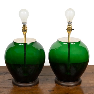 Lot 211 - A pair of green glass table lamps