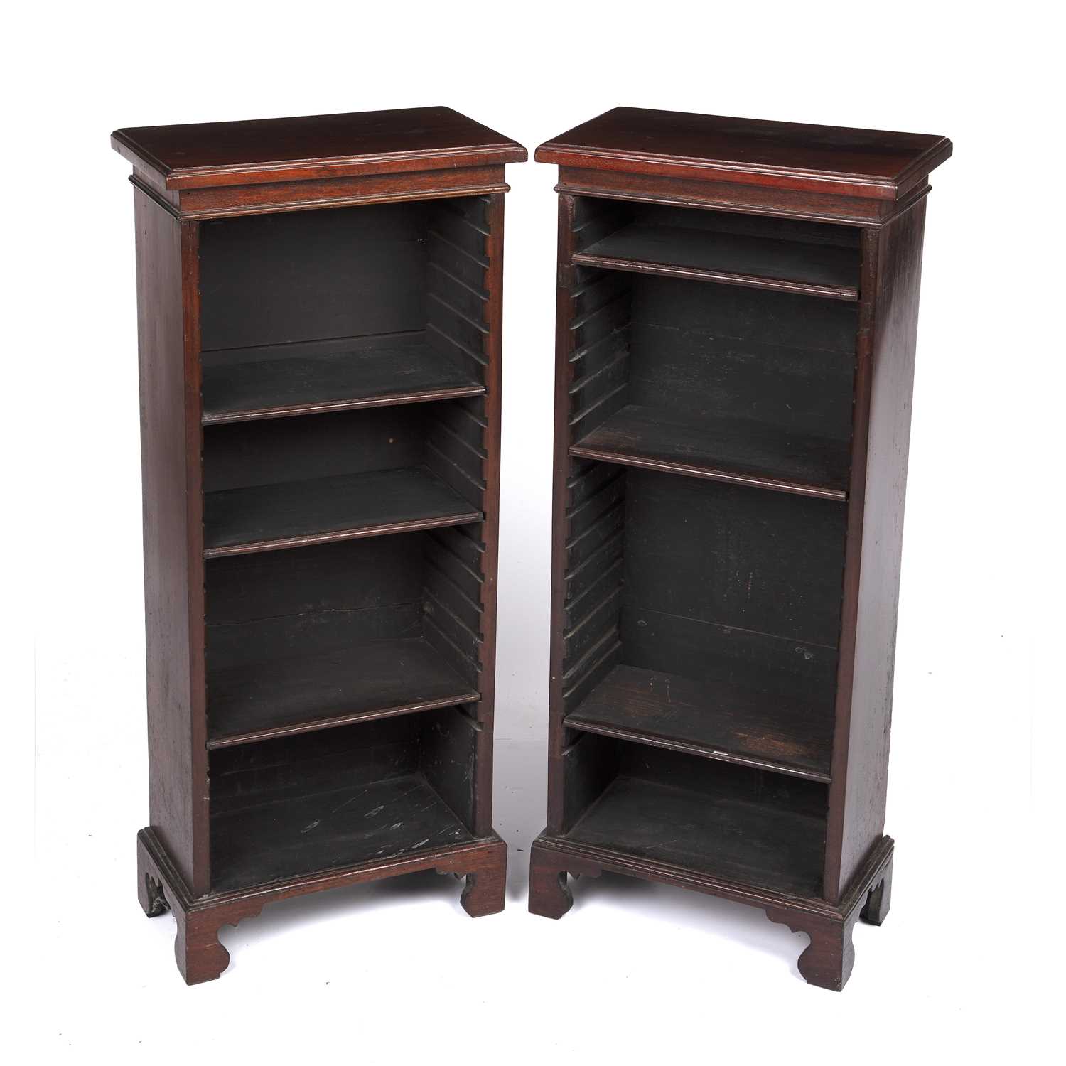 Lot 85 - A pair of small narrow rosewood bookcases with...