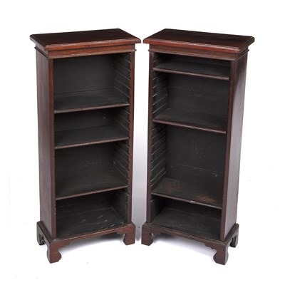 Lot 85 - A pair of small narrow rosewood bookcases with...