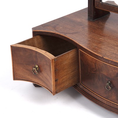 Lot 86 - A George III mahogany toilet mirror on a...