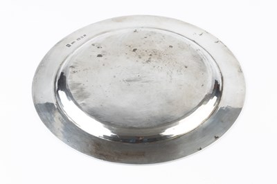 Lot 469 - A George V silver Arts & Crafts circular plate,...