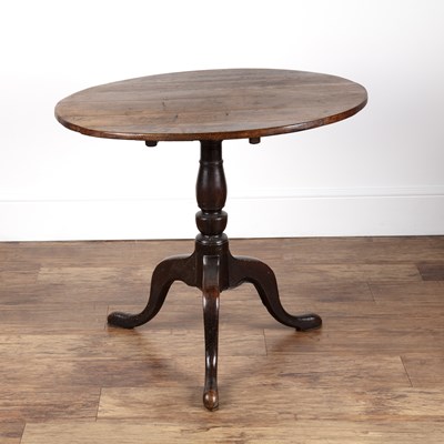 Lot 73 - Oak tip up occasional table 19th Century, on a...