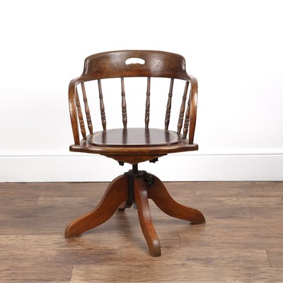 Lot 17 - Oak swivel office chair circa 1920, with a...