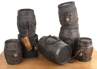Lot 409 - Seven various coopered oak and banded costrels...