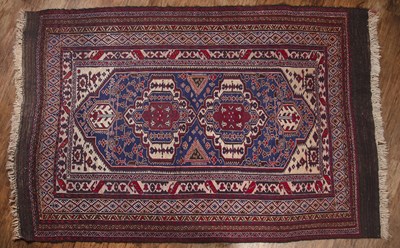 Lot 51 - Flat weave geometric pattern rug with a...