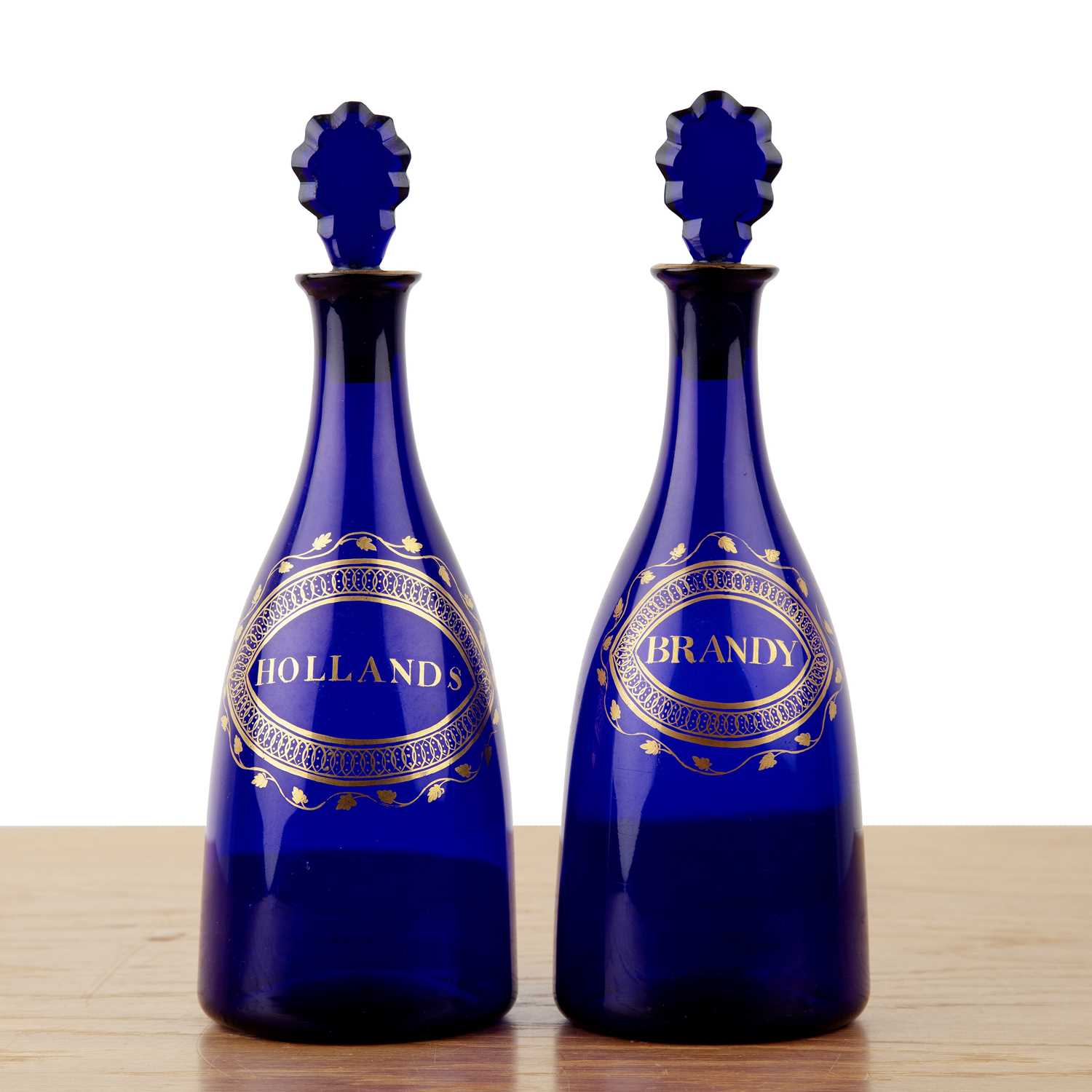Lot 360 - Pair of small blue glass decanters 'Brandy'...