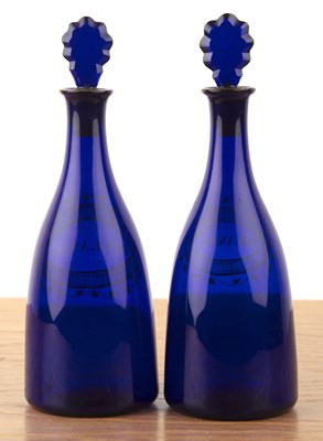 Lot 360 - Pair of small blue glass decanters 'Brandy'...