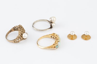 Lot 87 - An opal and diamond half hoop ring, the...