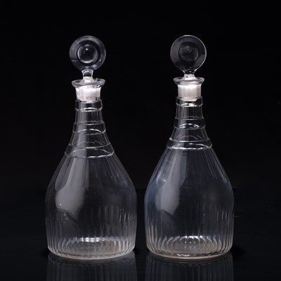 Lot 324 - Pair of glass decanters circa 1810, with cut...