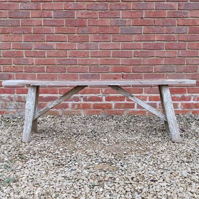 Lot 1507 - A rustic elm bench