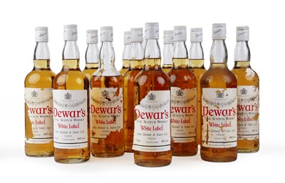 Lot 298 - Twelve 75cl bottles of Dewars white label,...