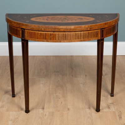 Lot 230 - A Georgian mahogany demi-lune card table