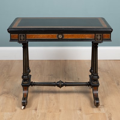 Lot 270 - An Aesthetic Movement ebony and walnut card table