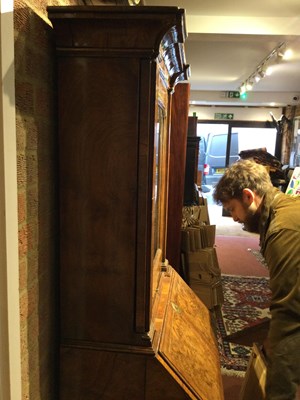 Lot 82 - An 18th century walnut bureau bookcase of...
