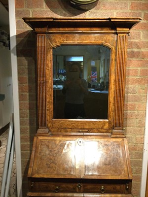 Lot 82 - An 18th century walnut bureau bookcase of...