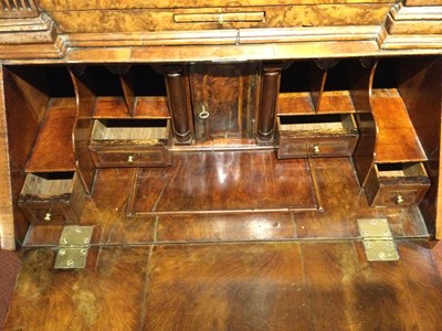 Lot 82 - An 18th century walnut bureau bookcase of...