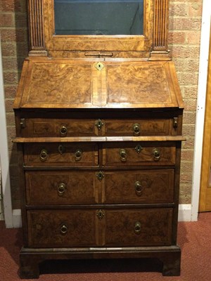 Lot 82 - An 18th century walnut bureau bookcase of...