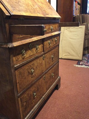 Lot 82 - An 18th century walnut bureau bookcase of...