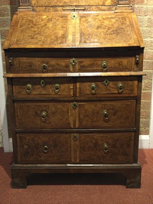 Lot 82 - An 18th century walnut bureau bookcase of...