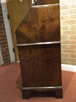 Lot 82 - An 18th century walnut bureau bookcase of...