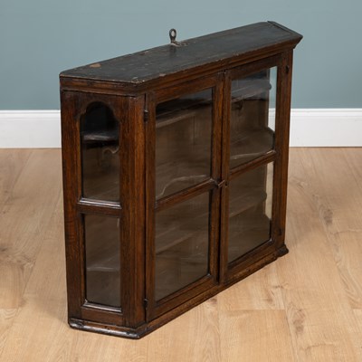 Lot 1165 - An 18th century Dutch oak wall cabinet