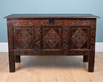 Lot 154 - An 18th century oak three-panelled coffer