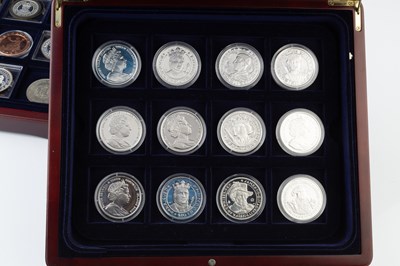 Lot 443 - A collection of twenty silver proof crowns,...