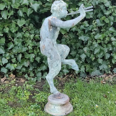Lot 1440 - A bronzed cast metal sculpture of Pan
