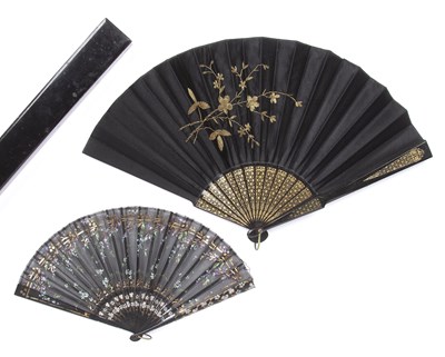 Lot 446 - Black silk and sequin fan early 20th Century,...