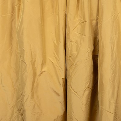 Lot 465 - Two pairs of gold-coloured silk, lined curtains