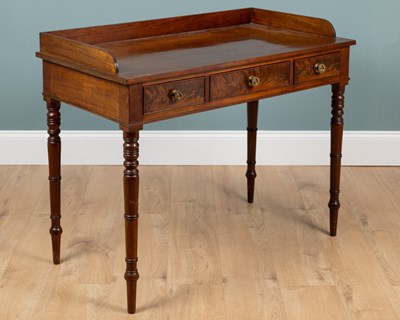 Lot 498 - A 19th-century mahogany gallery backed side table