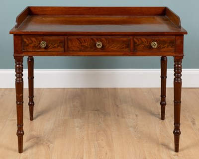 Lot 498 - A 19th-century mahogany gallery backed side table