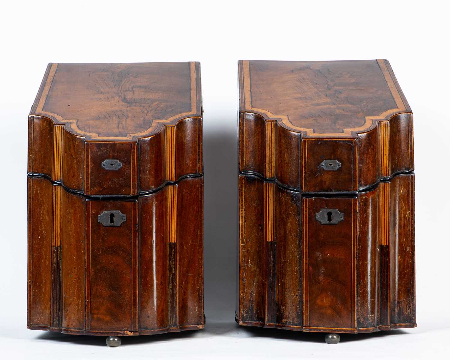 Lot 473 - A pair of George III mahogany knife boxes