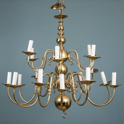 Lot 87 - A brass eighteen-branch chandelier