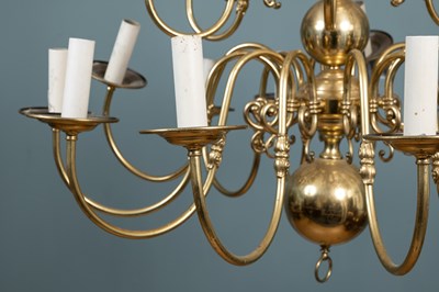 Lot 90 - A brass eighteen-branch chandelier