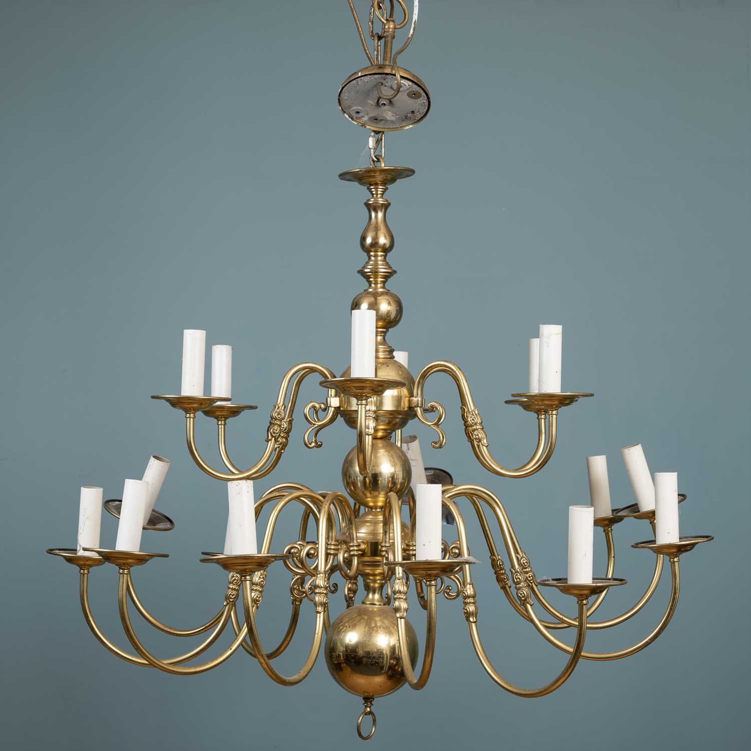 Lot 90 - A brass eighteen-branch chandelier