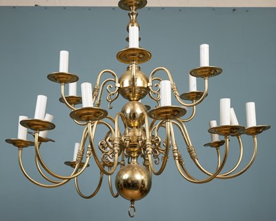 Lot 90 - A brass eighteen-branch chandelier